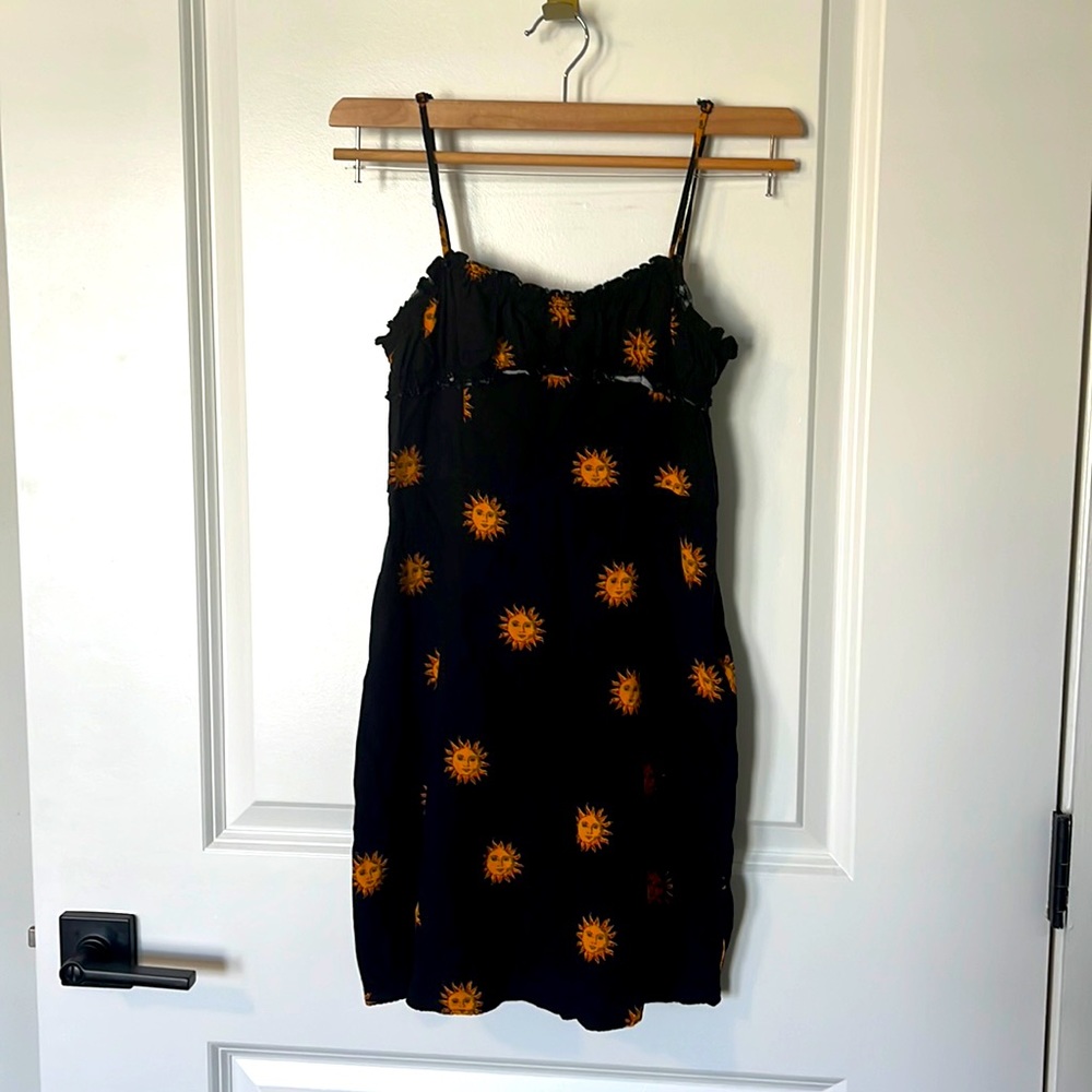 Sundress with suns. Size small-x small . Perfect summer dress